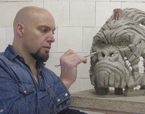 Matt Buckley, sculptor, working on his art